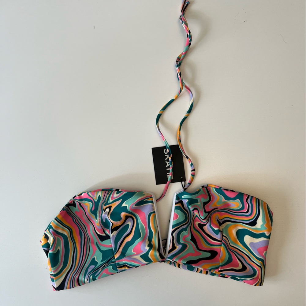 Never worn tags on Skatie bikini top